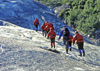 Alaska - Glacier Bay NP: Glacier Track - group climbing on the ice - photo by A.Walkinshaw