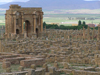 Algrie - Timgad: Arc de Trajan parmi les ruines - plan hippodamien - photographie par J.Kaman