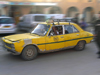 Algeria / Algerie - El Oued: taxi on the move - Peugeot 504 - photo by J.Kaman