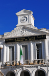 Algeria / Algrie - Bejaia / Bougie / Bgayet - Kabylie: city hall - balcony and clock | Mairie - balcon et horloge - sur le fronton de l'difice figurent les armes de la ville - Commune de Bejaia - Tagiwant N Bgayeth - photo by M.Torres