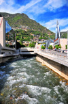 Escaldes-Engordany, Andorra: looking upstream along the River Valira - Andbank private bankers HQ and Caldea spa - view from the bridge on Carrer de Manel Cerqueda i Escaler - photo by M.Torres