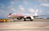 Aruba - Camacuri: pushing back an American Airlines Boeing 757 Luxury Jet at Queen Beatrix Airport (photo by M.Torres)