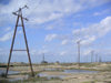 Azerbaijan - Artyom - Pirallahi Island - Absheron peninsula - Baki Sahari: electricity cables and an oil pipeline - photo by Austin Kilroy