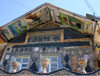 Ganca / Ganja - Azerbaijan: bottle house - vases and faade detail - two-storey building decorated with about 50.000 glass bottles - photo by F.MacLachlan