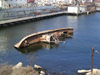 Baku, Azerbaijan: a boat rests on its portside - harbour - photo by G.Monssen