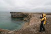 Bear Island / Bjrnya, Svalbard: visitor on the bird cliffs, above a beach - photo by R.Behlke