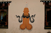 Bhutan - phallus - symbol of fertility, painted on a house in Metshina - lingam - photo by A.Ferrari