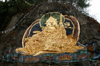 Bhutan - Guru Rinpoche, painted on a large rock outside Thimphu - Padmasambhava - brought Tantric Buddhism to Tibet in the 8th century - photo by A.Ferrari