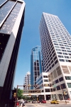 Canada / Kanada - Calgary, Alberta: 5th Street SW - intersection with 4th Avenue SW - Regency house on the left - Ernst & Young tower in the background - photo by M.Torres