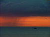 Canada - Ontario - Lake Ontario: rain against a red sky - photo by R.Grove