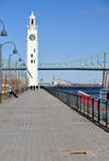 Montreal, Quebec, Canada: promenade and Clock tower, built in 1922 to honour the mariners who perished at sea during the First World War - waterfront of the St. Lawrence River and Jacques Cartier bridge - Vieux-Port - photo by M.Torres