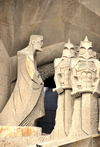 Barcelona, Catalonia: Gaud's Sagrada Familia cathedral - Passion faade - Roman soldiers and evangelist with Gaudi's face, sculpted by Subirachs - photo by M.Torres