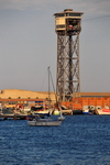 Barcelona, Catalonia: sailing by the Torre de Sant Sebasti (1931), Port Vell Aerial Tramway - architect Carles Bugas - Barceloneta - photo by M.Torres