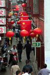 Shanghai, China: Old Qibao town - red lanterns and red flags - photo by Y.Xu