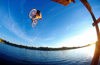 Denmark, Copenhagen: mountain biker jumping over the water - photo by S.Egeberg