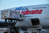 Punta Cana, Dominican Republic: Air Pullmantur Boeing 747-341 EC-IOO - catering truck and open baggage hold / cargo bin - Punta Cana International Airport - PUJ / MDPC - photo by M.Torres