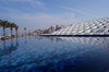 Egypt - Alexandria: the library - Bibliotheca Alexandrina - from the pond - design by Snohetta (photo by John Wreford)