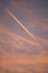 Durdle door, Dorset, England: airplane trail in morning sky - photo by I.Middleton