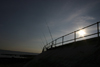 Lee on Solent, Gosport, Hampshire, South East England, UK: fishermen fishing off seafront as sun goes down - photo by I.Middleton