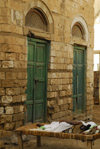 Eritrea - Massawa, Northern Red Sea region: a woman sleeping al fresco - old quarter - photo by E.Petitalot