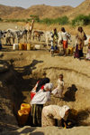 Eritrea - Hagaz, Anseba region - desert well - women drawing water - photo by E.Petitalot