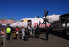 Addis Ababa, Ethiopia: Bole International Airport (IATA: ADD, ICAO: HAAB) - Ethiopian Airlines - Fokker 50 - passengers disembark - photo by M.Torres