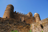 Gondar / Gonder, Amhara Region, Ethiopia: Royal Enclosure - Fasiladas' Palace / castle - seen form the cistern - architecture of the Gondarine Renaissance - photo by M.Torres