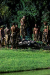 Pacific Harbor, Viti Levu, Fiji: traditional Fijian firewalkers of Beoa in costume walking on fire at Pacific Harbor Cultural Center - photo by C.Lovell