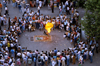 Paris: fire eating - street artist - seen from the roof of Centre Georges Pompidou - 4th arrondissement - photo by Y.Baby