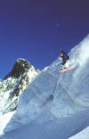 La Grave, Brianon, Hautes-Alpes, PACA, France: off Piste snowboarder jumping on the glacier - photo by S.Egeberg