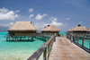 Papetoai, Moorea, French Polynesia: InterContinental Hotel - a pontoon leads to the overwater bungalows - photo by D.Smith