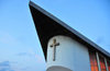 Libreville, Estuaire Province, Gabon: St Peters's Cathedral at dusk - triangular roof - Cathdrale St. Pierre - Rue du Governeur Balley - photo by M.Torres