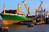 Banjul, The Gambia: port of Banjul - the container ship Kollmar - deck cranes - photo by M.Torres