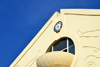 Banjul, The Gambia: balcony and clock without hands, hollow-arched pediment of the triumphal arch at the entrance to the capital - Arch 22 - marks the coup d'etat of 1994 - photo by M.Torres