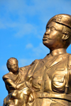 Banjul, The Gambia: unknown soldier carrying a baby, symbolizing liberation from dictatorship - looks a bit like a medieval Virgin Mary with an out of proportion baby Jesus - Arch 22, the gate to Banjul - marks the coup d'etat of July 22, 1994, led by Yahya Jammeh - photo by M.Torres