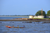 Barra, The Gambia: Fort Bullen and fishing boat - fortress named after Commodore Charles Bullen - UNESCO world heritage - Barra Point, estuary of the River Gambia - built by the British in 1826 to block the slave trade - photo by M.Torres