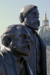 Berlin, Germany: monument to Karl Marx and Friedrich Engels, theoretical inventors of communism and the Dome of the Cathedral - photo by W.Schmidt