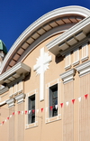 Gibraltar: cross on the facade of the Catholic Cathedral of Saint Mary the Crowned, Main Street - curved pediment - photo by M.Torres