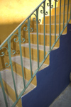 Greece, Dodecanese Islands,Rhodes: green painted stair guard against blue and orange painted steps - photo by P.Hellander