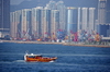 Hong Kong: boat and apartment towers, Kowloon - photo by M.Torres