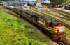 India - Tamil Nadu - Madurai: train leaving the station - photo by W.Allgwer