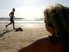 Israel - Kibbutz Sdot Yam: jogging - beach at dusk - photo by Efi Keren