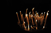 Jerusalem, Israel: candles placed by the faithful burn brightly inside the Holy Sepulcher church - Christian quarter - photo by M.Torres