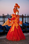 Carnival participant with Carnival costume at Dawn by Canale di San Marco, Venice - photo by A.Beaton