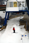 Kazakhstan - Chimbulak ski-resort, Almaty: skier at the terminal between the 1st and 2nd stages - photo by M.Torres