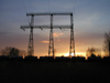 Latvia / Latvija - Riga: freight train at sunrise - train silhouette (photo by Alex Dnieprowsky)