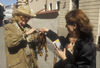 Vilnius, Lithuania: amber street-trader - photo by D.Forman