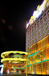 Macau, China: the original Casino Lisboa at night - hotel entrance - photo by M.Torres