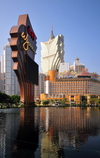 Macau, China: Wynn Macau fountain - Wynn sign, Bank of China tower and the old and new Casino Lisboa - photo by M.Torres