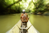 Skandis, Lubok Antu District, Sarawak, Borneo, Malaysia: on a long boat on the Kesit River, near Skandis - photo by A.Ferrari